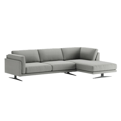 Side view of the Ozzy sofa showing relaxed proportions and cushioned design